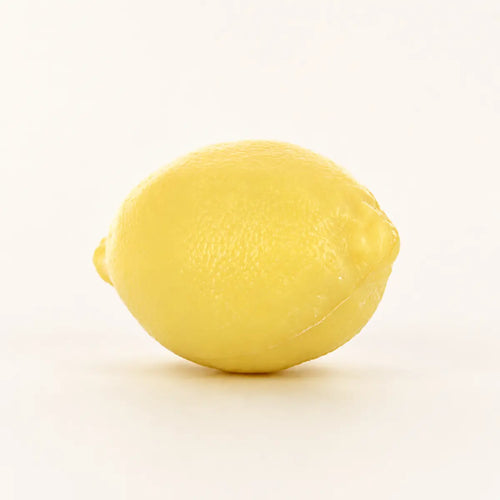 Yellow lemon-shaped 125g French soap with realistic citrus texture