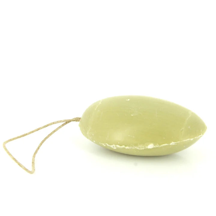 A light olive green soap bar with a natural jute hanging loop, photographed on a seamless white background.