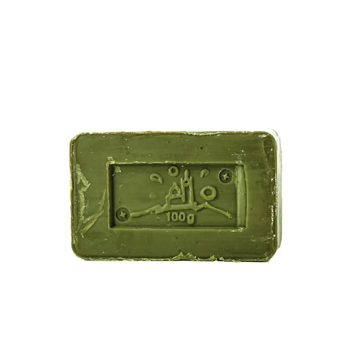A rectangular bar of olive green soap with rounded corners, featuring an embossed logo and '100g' text in the center, isolated on a white background.