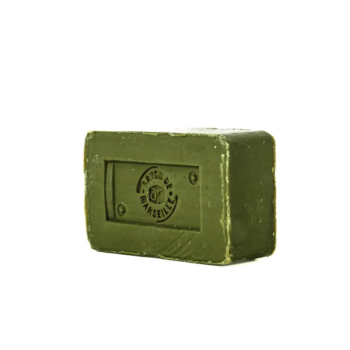 A rectangular bar of olive green soap with a recessed square panel on the front featuring an embossed circular logo that reads 'SAVON DE MARSEILLE'.