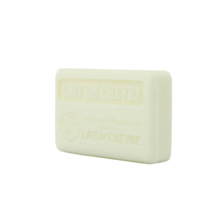 A white rectangular bar of soap with rounded corners, featuring an embossed logo and text in the center, set against a plain white background.