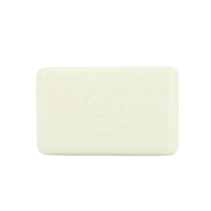 A pale cream-colored rectangular bar of soap with rounded corners, featuring an embossed logo and text in the center, set against a plain white background.