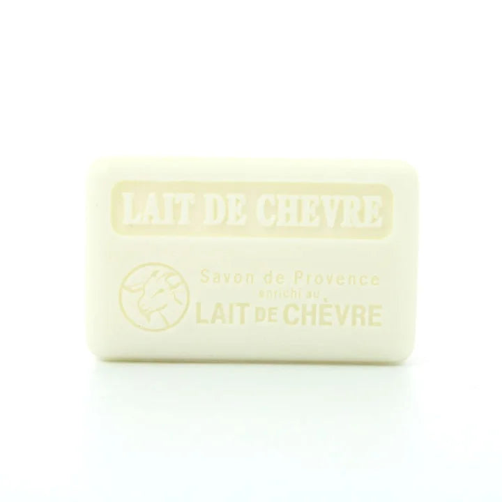 A rectangular bar of goat milk soap with embossed text reading 'LAIT DE CHEVRE' and a goat logo, shown on a clean white background.