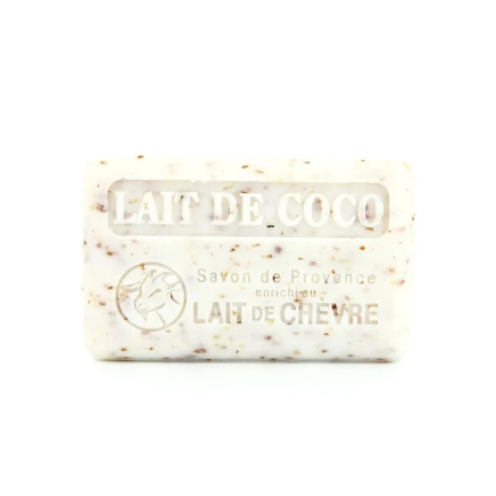 A rectangular bar of goat milk soap with white and light brown speckles, featuring embossed text reading 'LAIT DE COCO' and 'LAIT DE CHEVRE' on a white background.