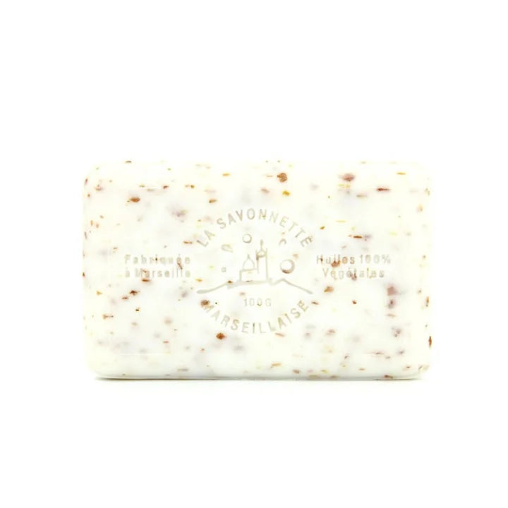 A rectangular bar of Marseille soap with white cream-colored base and brown speckles, embossed with 'La Savonnette des Moulins' and 'Marseilleaise'.