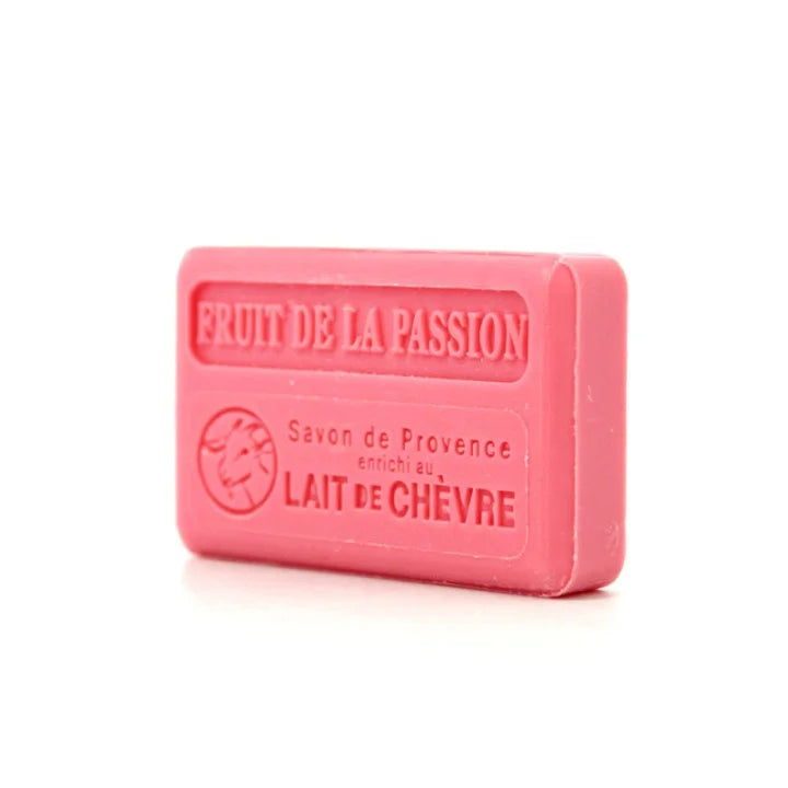 A pink rectangular bar of soap sideways with embossed French text reading 'FRUIT DE LA PASSION' and 'SAVON DE PROVENCE ENRICHI AU LAIT DE CHEVRE', shown on a white background.