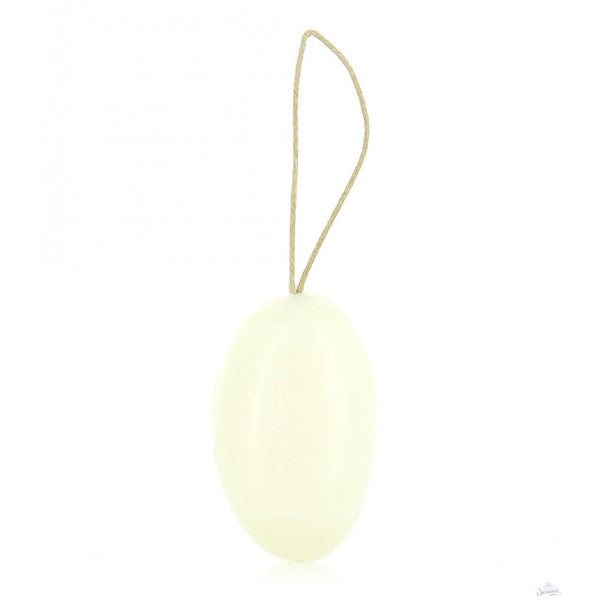 An oval-shaped, white translucent soap bar with a natural jute hanging loop, shown on a solid white background.