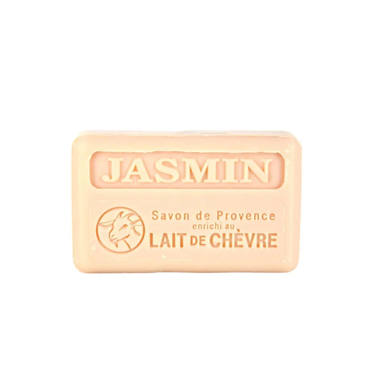 A rectangular bar of Jasmin soap in a pale peach-beige color, featuring embossed text and a goat logo on a plain white background.